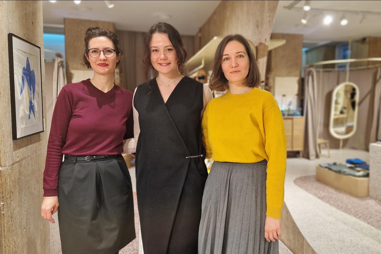 Ukrainian refugee Vladyslava Terekhovych pictured with her social enterprise employers in Romania